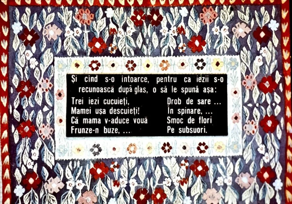 Poem tradițional despre iezi, cu versuri reprezentative scrise pe un fundal decorat cu flori.