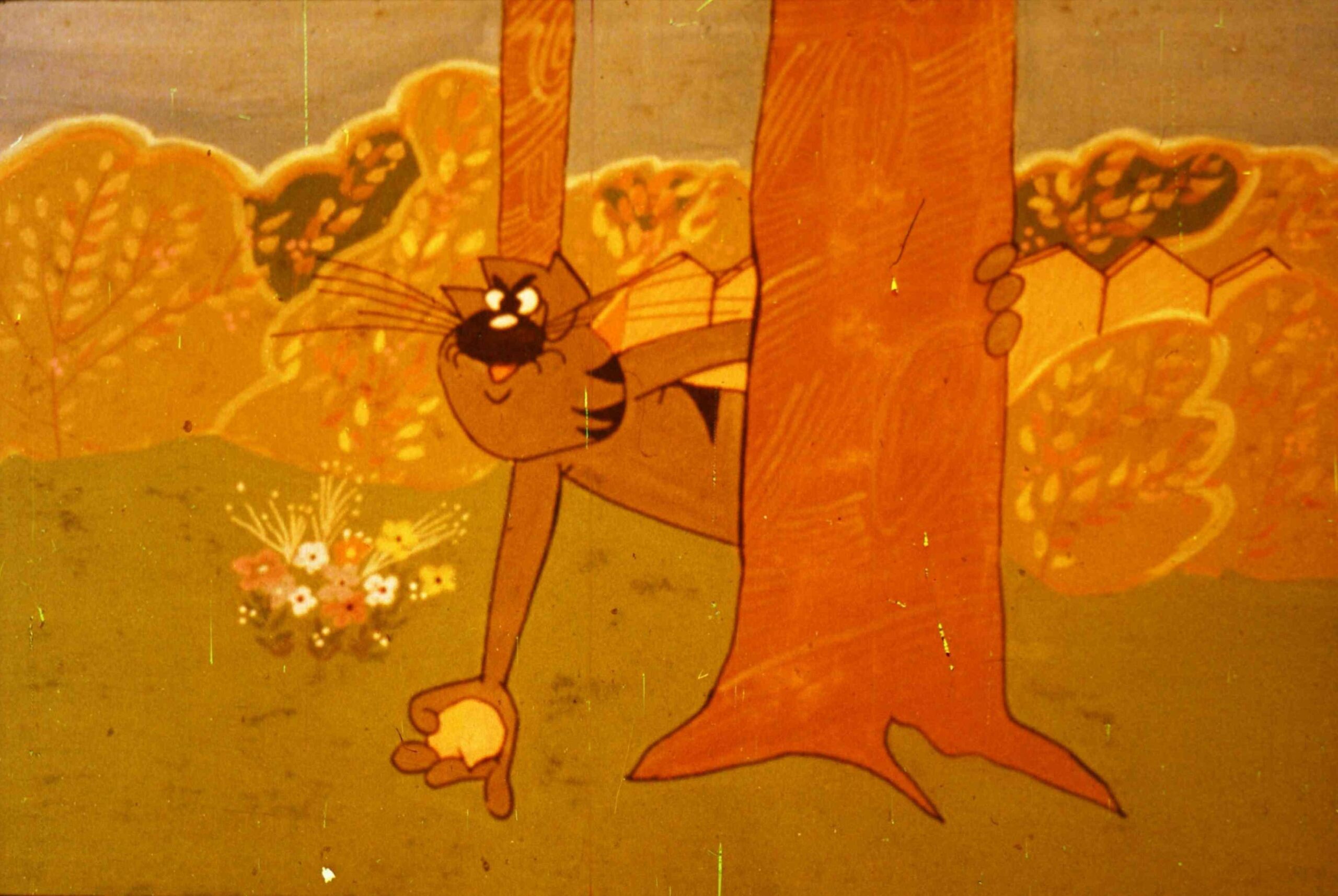 Ilustrație cu un motan care se ascunde după un copac, dorind să se hrănească din bunătățile din apropiere.