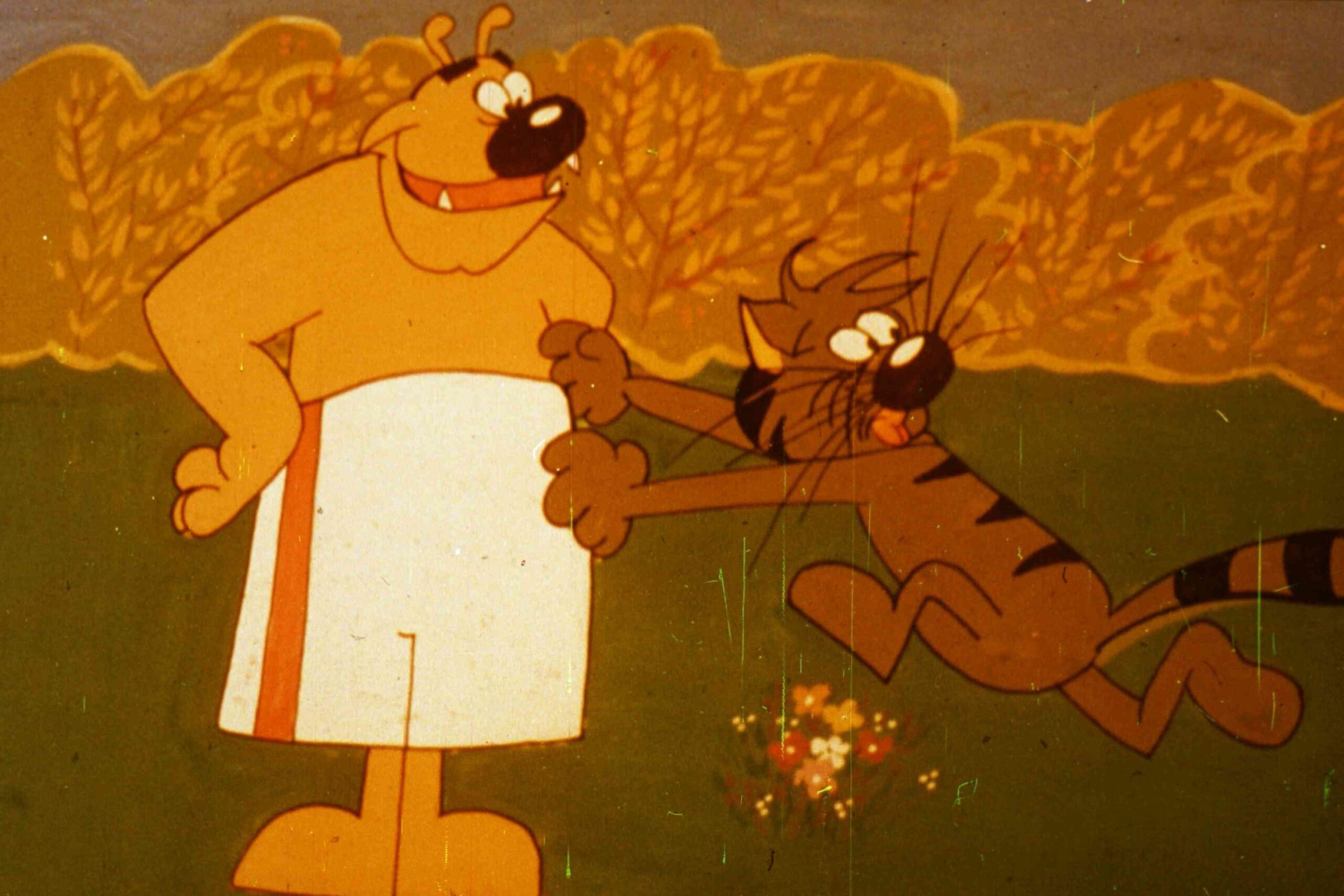 Două personaje animaliere vorbesc într-un peisaj de vară.