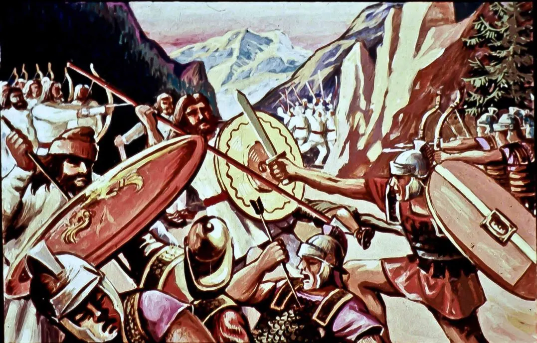 O imagine care ilustrează o bătălie istorică, cu soldați înarmați, scuturi și arme, desfășurându-se pe un fundal montan.