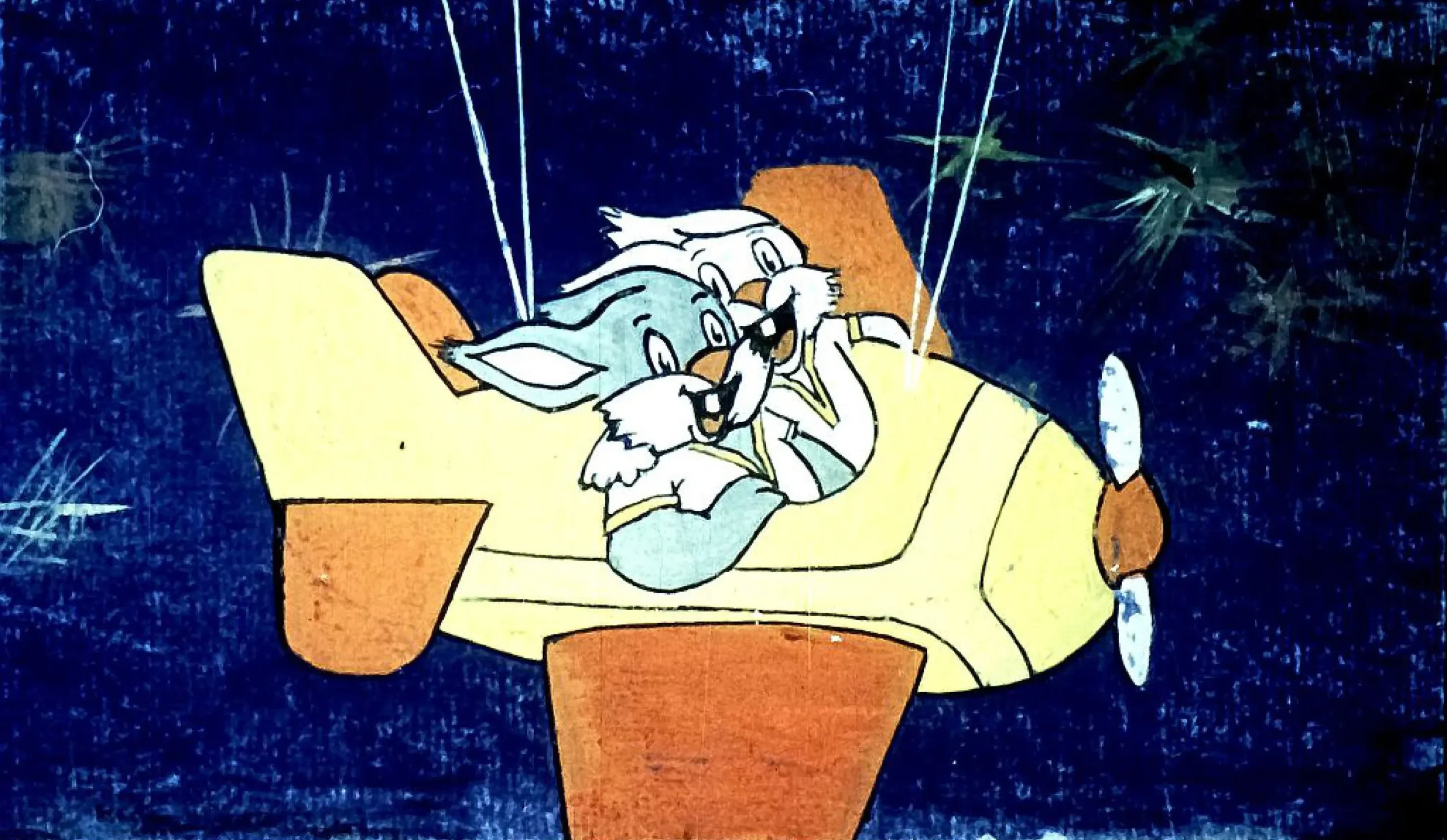 Două personaje de animație zburând într-un avion colorat.