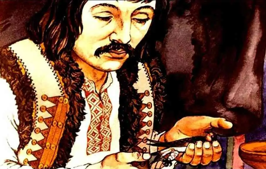 Un bărbat îmbrăcat în tradițional, ținând un obiect în mână, reflectând la o poveste despre un pui rănit.