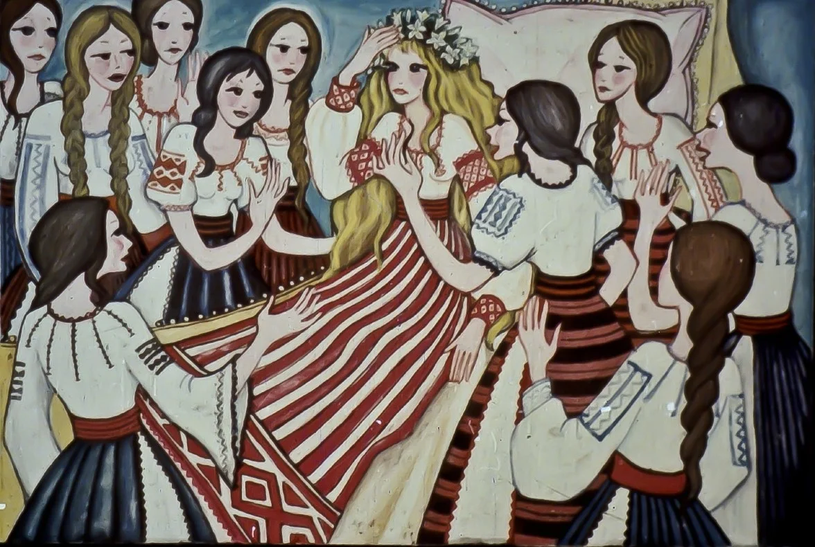 Ilustrație artistică cu un grup de femei care îmbrățișează o figură centrală, reprezentând un moment mitologic.