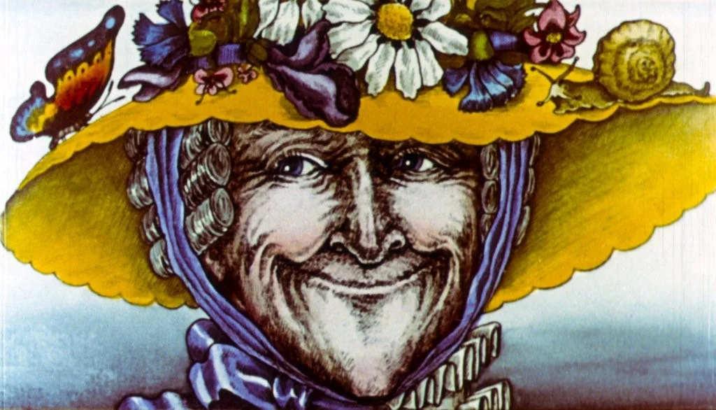 O ilustrație colorată a unei femei cu o pălărie mare, galbenă, decorată cu flori, care zâmbește.