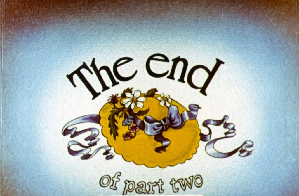 Text that says 'The end of part two' with decorative elements.