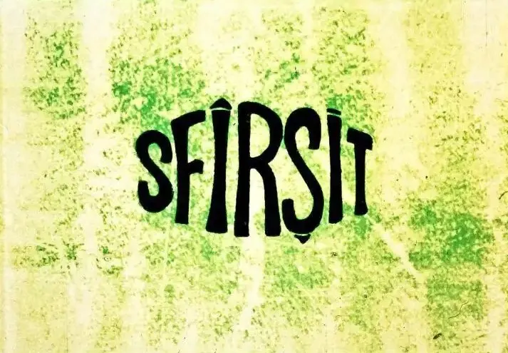 Text scris cu litere mari, cu un fundal verde și galben, care spune 'sfârșit'.