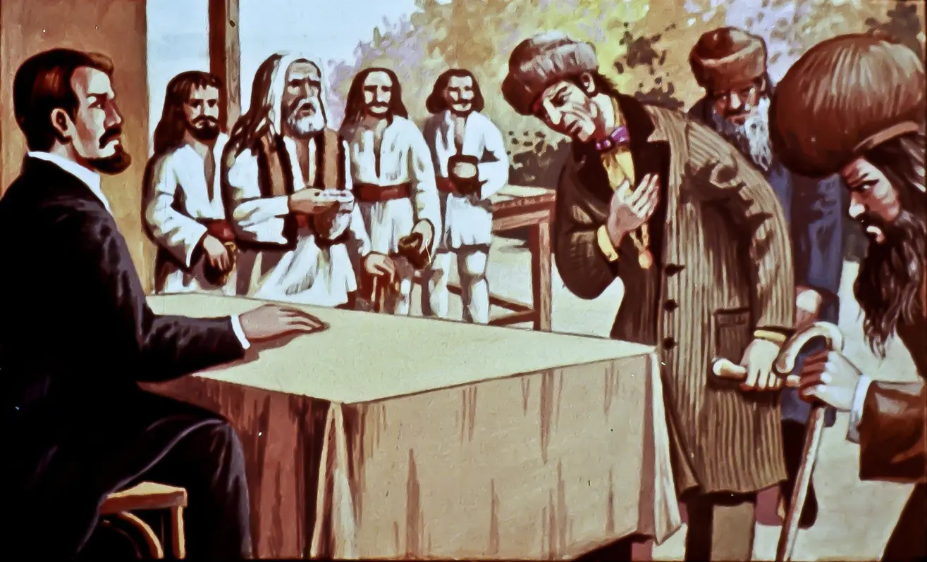 O scenă istorică cu un bărbat îmbrăcat în costume specifice, stând la o masă în fața altor bărbați, în timp ce unul dintre ei se înclină în fața sa.