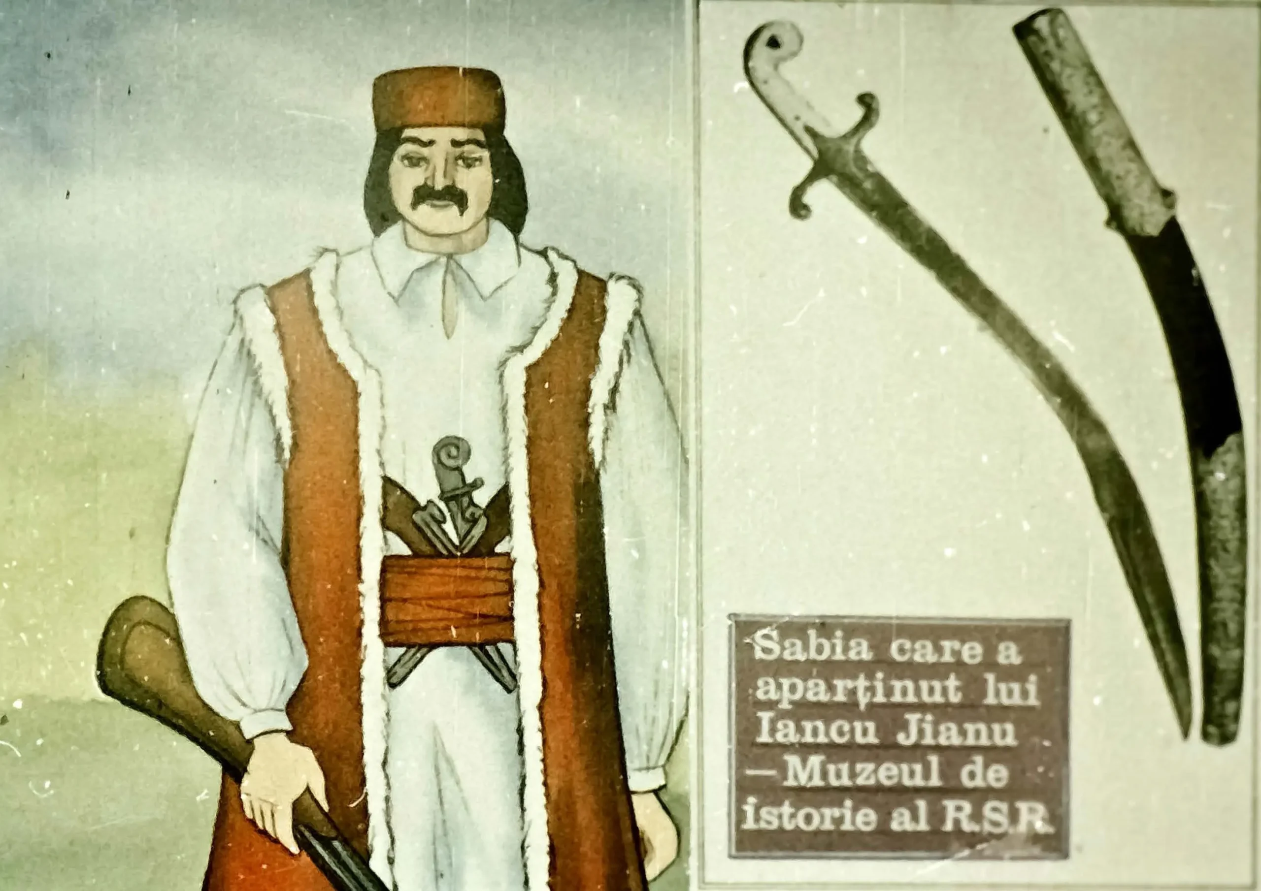 Imaginea prezintă un personaj istoric, Iancu Jianu, înarmat cu o sabie, pistol și cuțit, într-un context cultural specific.