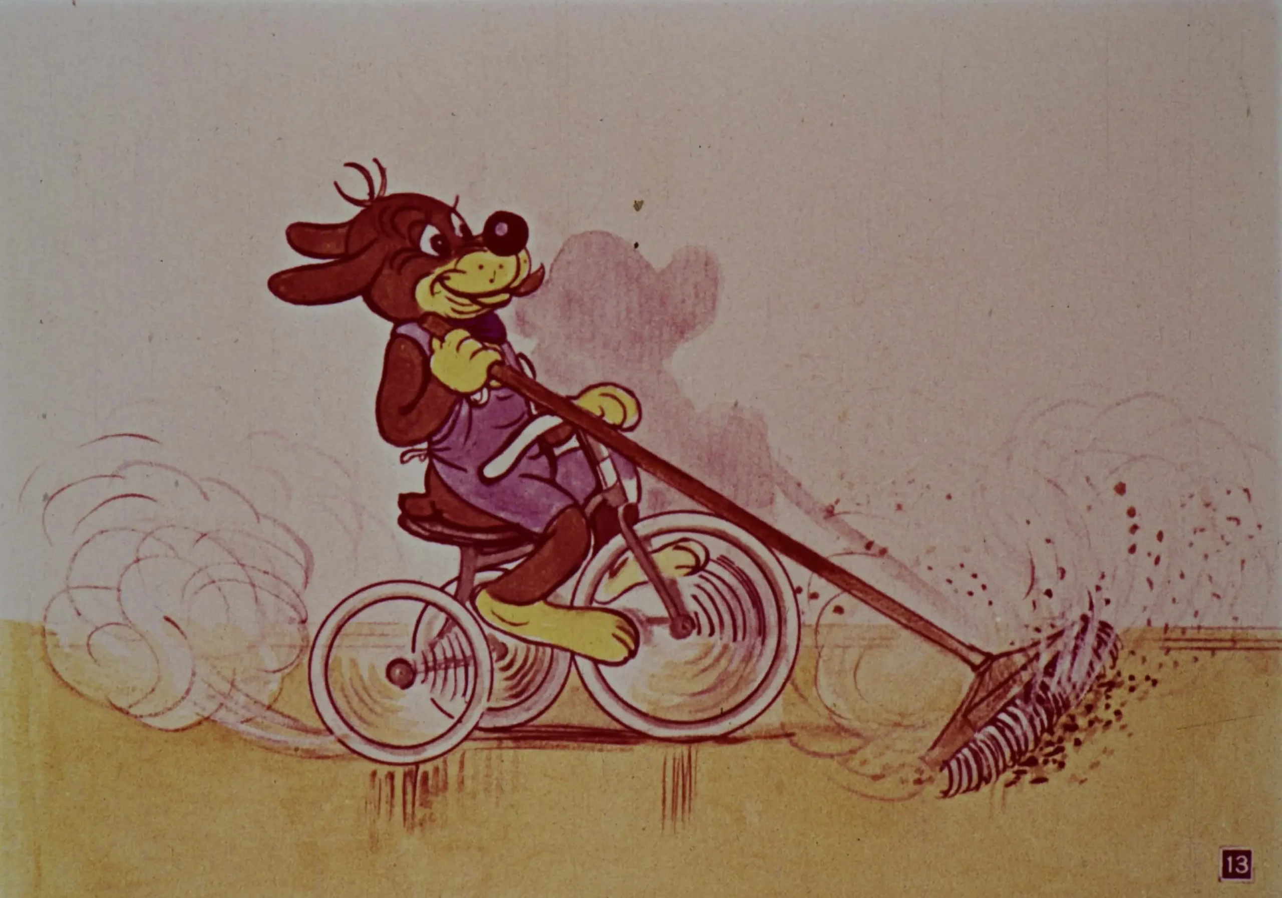 Un câine animat pe o bicicletă cu un foarfece de pământ în spate, acoperind o zonă de pământ.