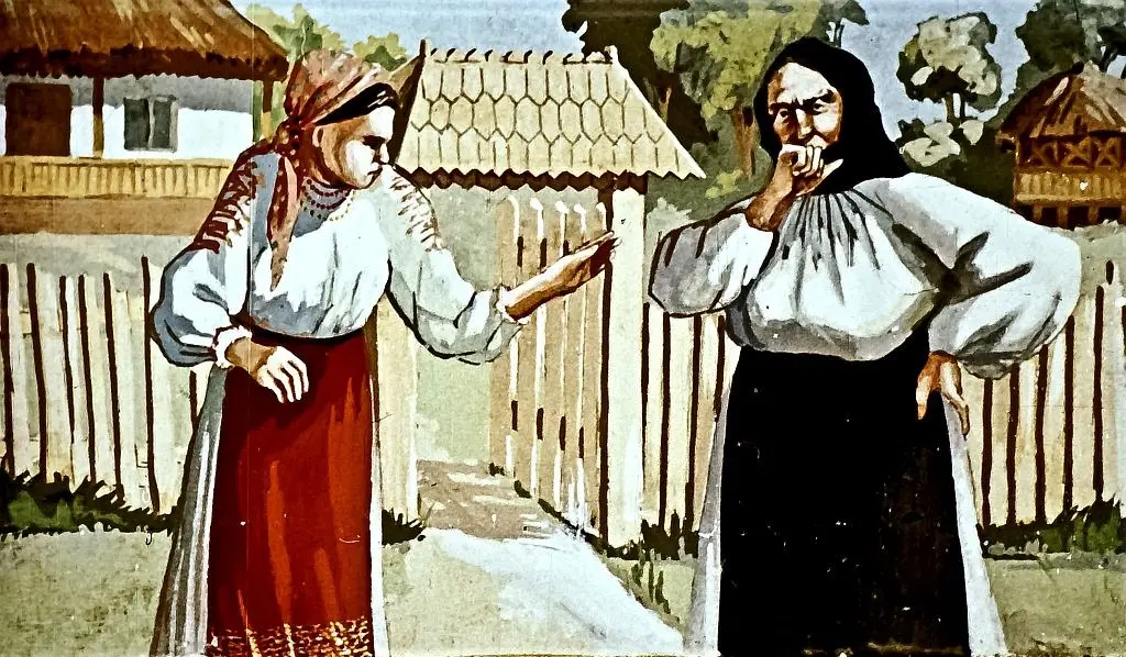 Două femei dialoghează într-un context rural, una întreabă despre bogății.