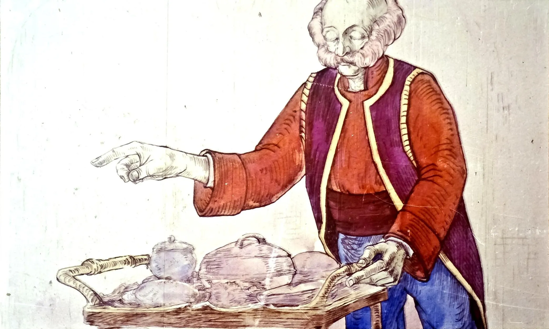 Un bărbat mai în vârstă îmbrăcat în haine colorate, care arată cu degetul către un platou cu diverse vase.