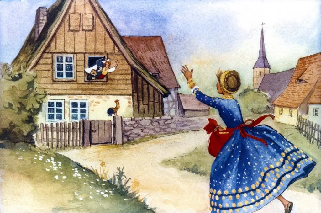 O fată roscata imbracata in haine traditionale germane