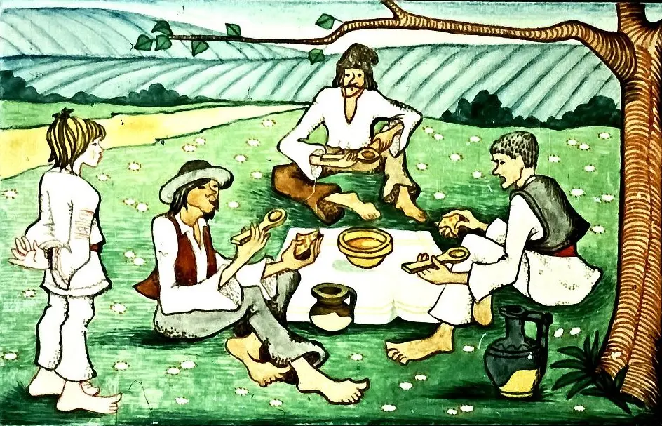 Ilustrație cu patru persoane așezate pe iarbă, înconjurate de un peisaj natural, care degustă mâncare de pe o masă.